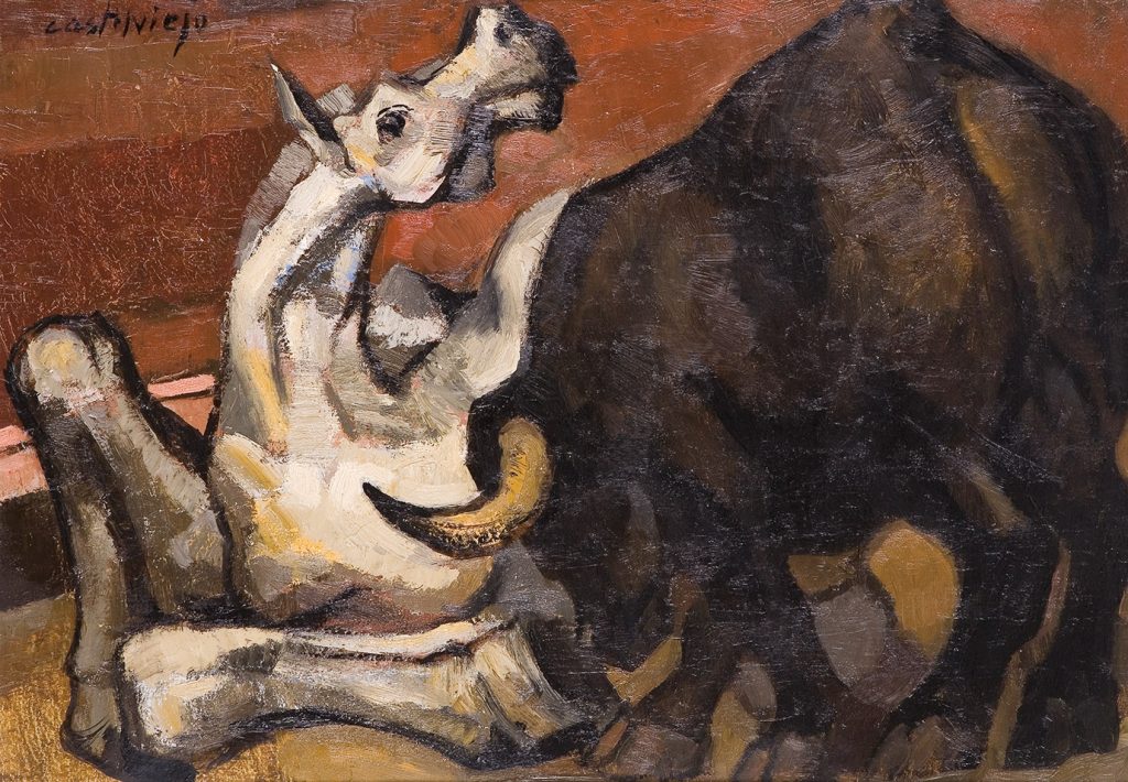 toro embistiendo caballo